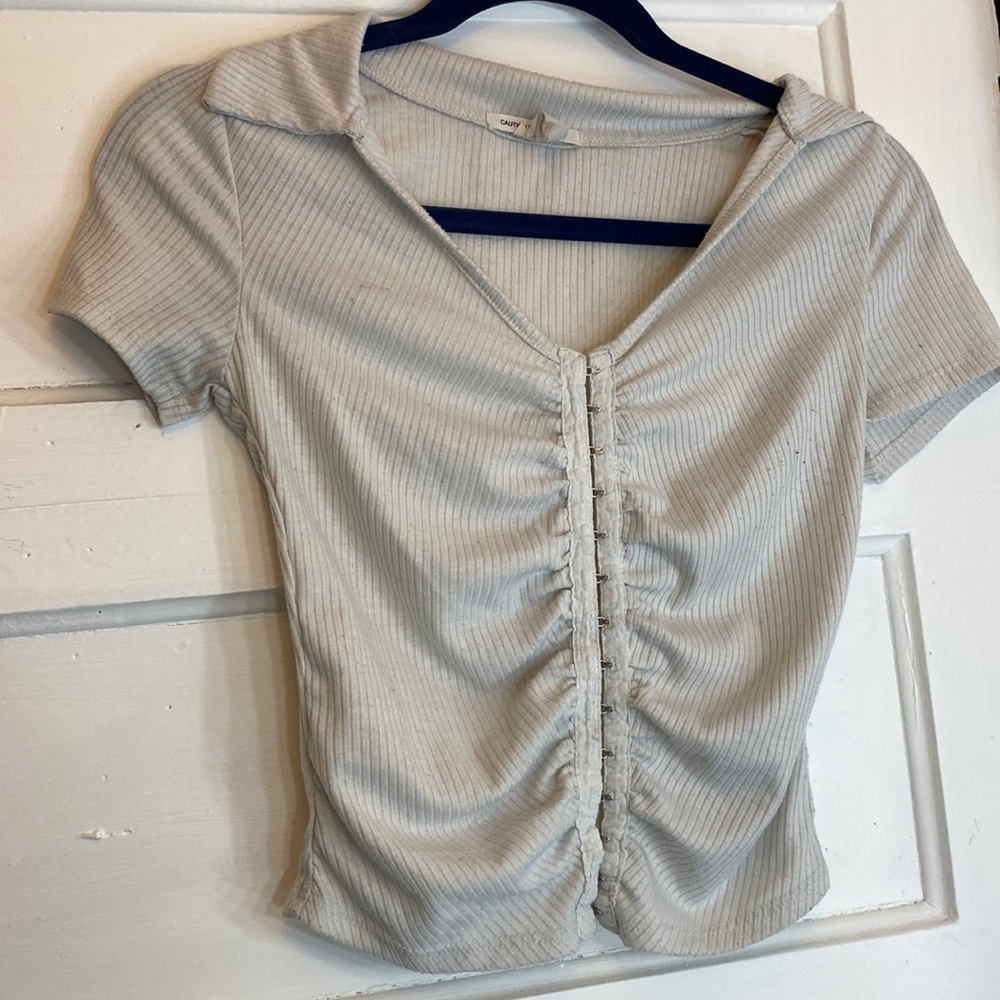 White caution to the wind shirt